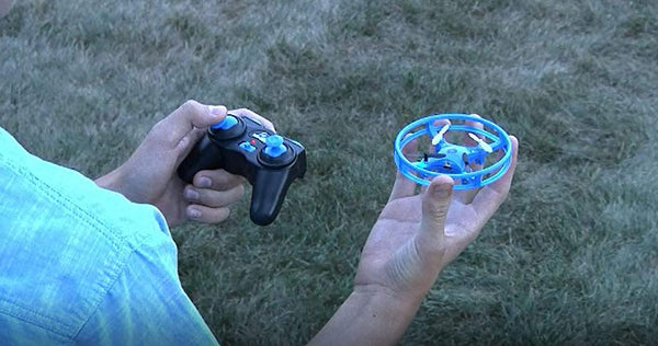 Mindscope Sky Lighter Disc Drone Blue Light Up LED Glow Stunt Action Radio Control RC Technology